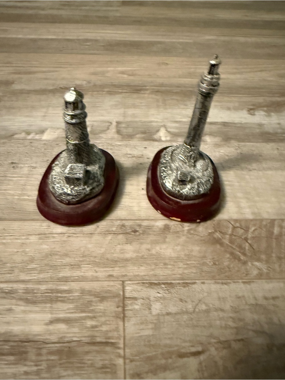 Decorative Silver Lighthouse Figurines on Red Bases - Home Accents